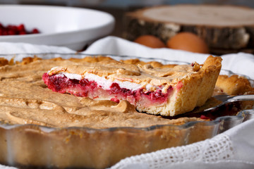 Homemade cowberry tart with merengue.