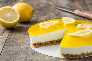 Lemon pie on wooden background
