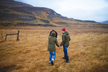 Walking Couple in Field