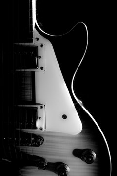 Electric guitar isolated on a black background black and white p