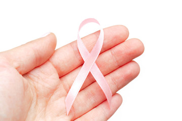 female hands holding AIDS awareness ribbon