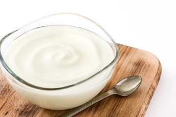 Greek yogurt in glass bowl isolated on white background
