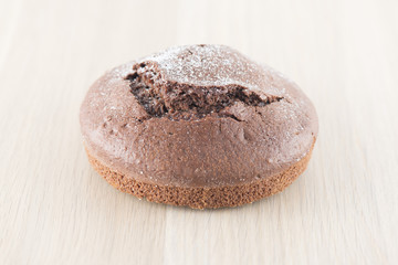 Cocoa Cake on wooden background