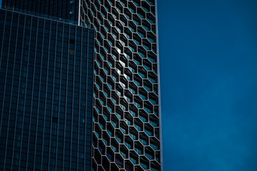 Honeycombed facade on skyscraper in Singapore