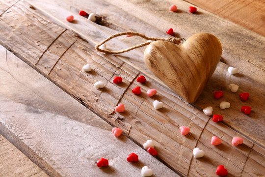 Valentines day background. hearts on wooden table