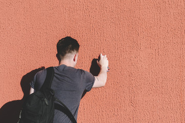 Man Writing A Graffiti