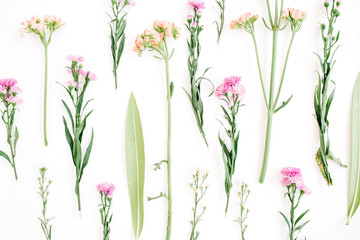 Fototapeta na wymiar Colorful wildflowers on white background. Flat lay, top view. Valentine's background