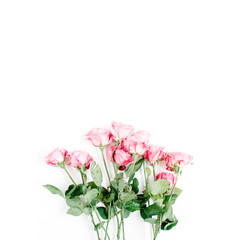 Pink roses bouquet on white background. Flat lay, top view. Valentine's background.