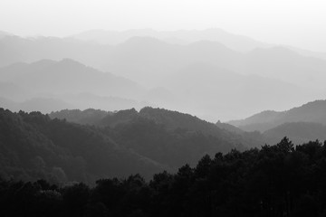 A black & white of a layer of mountain.