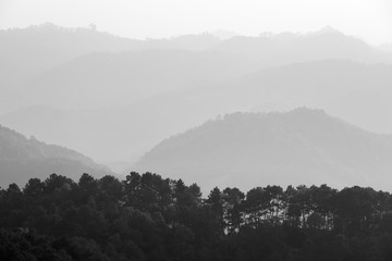 A black & white of a layer of mountain.