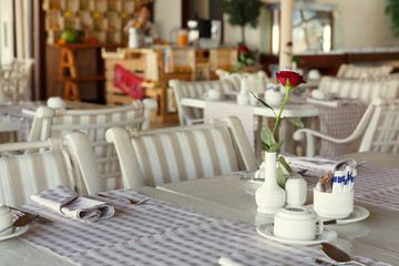 restaurant table setting, with bright colors and the style of Pr