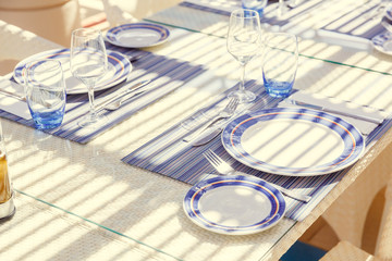 restaurant table setting, with bright colors and Mediterranean-s