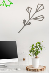 Minimalist workstation with a potted plant