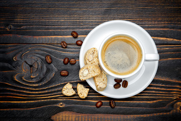 canticcini and coffee on wooden background
