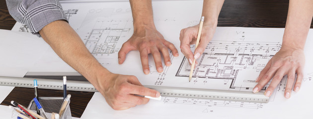Architects creating home floor plan