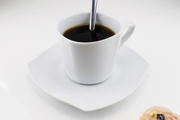 Tasse Kaffee mit Gebäck