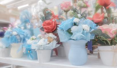 Flower shop / Colorful flower on shelf in the store. Shallow depth of field.