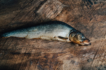 cured fish on a wooden board