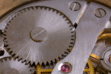 Macro cog clockwork mechanism close up micro working of watch with metallic wheel timepiece precise...