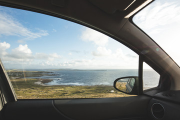 Car window view of the Bun na Leaca coast, County Donegal. Irela