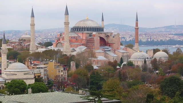 Aerial view of Hagia Sophia in Istanbul. Panoramic view of the city with a very famous attraction for tourism and religion. On background there are Bosphorus strait and Asian side of the city.