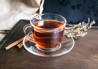 Sagebrush twig, cup of tea and cinnamon