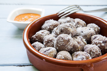 Potatoes with mojo sauce