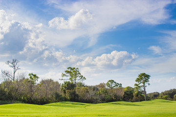 Golf Course under Beautiful Sky
