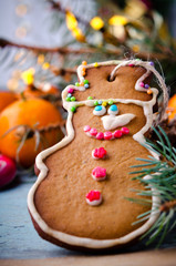 Christmas, New Year Composition with Gingerbread Man, Tangerines and Candy Canes. Shiny Holiday Decoration