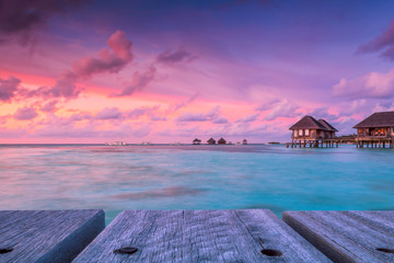 Wonderful twilight time at tropical beach resort in Maldives - obrazy, fototapety, plakaty