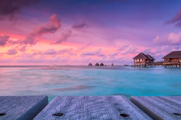 Photo sur Plexiglas Mer / coucher de soleil Wonderful twilight time at tropical beach resort in Maldives