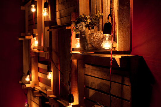 Christmas decor with garlands and wooden boxes in the Studio