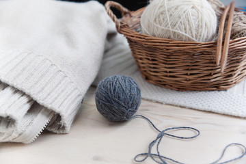 Fototapeta na wymiar a large ball of wool and wooden needles