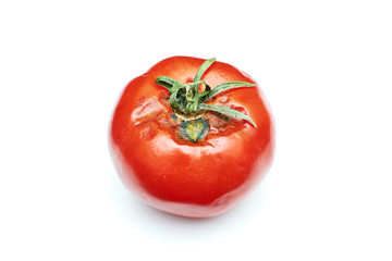 spoiled tomato on white background