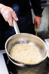 chef making risotta