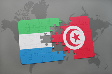 puzzle with the national flag of sierra leone and tunisia on a world map