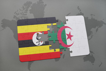 puzzle with the national flag of uganda and algeria on a world map