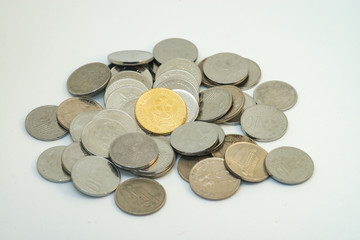 Pile of silver and gold colour of Malaysian coins with white background