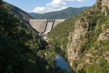 Fototapeta na wymiar Dam of the Vacha (Antonivanovtsy) Reservoir, Rhodopes Mountain, Bulgaria