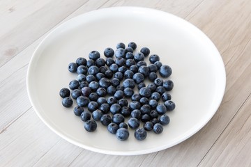 Blueberries on a white plate