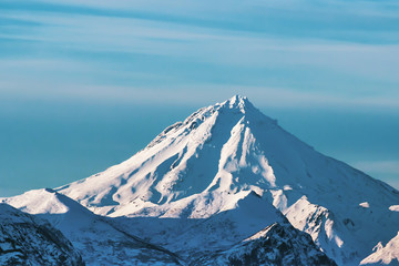 big volcano covered with snow