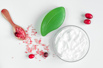 organic cosmetics with extracts of berries white background top view