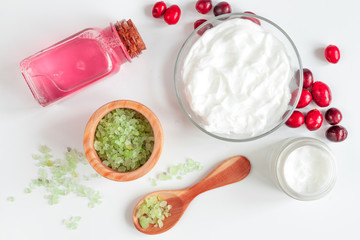 organic cosmetics with extracts of berries white background top view