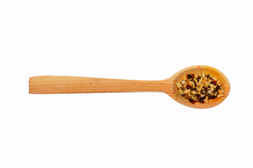 universal spices in wooden spoon