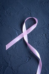 concept - cancer top view on dark background