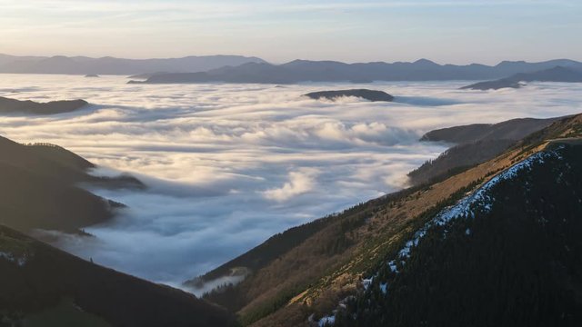 Epic Foggy Morning above Mist Clouds Flows in Winter Mountain Valley Time Lapse 4K