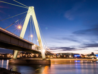 Fototapeta na wymiar Bridge and river rhine in the evening in late sunset light