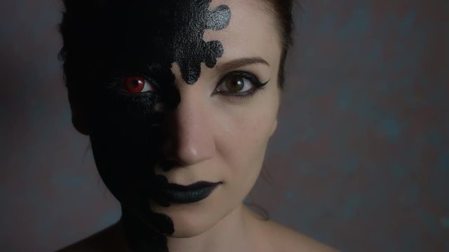 4k Shot of a Woman with Halloween Make-up Turning to Camera