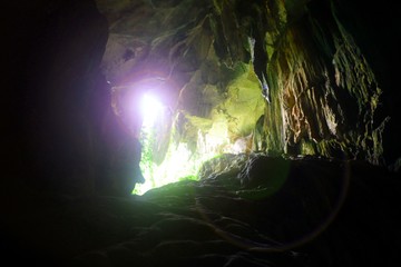 Cave with sunlight glare passing through
