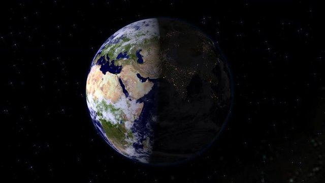 Camera spinning around planet Earth. Day to night. Elements of this image furnished by NASA